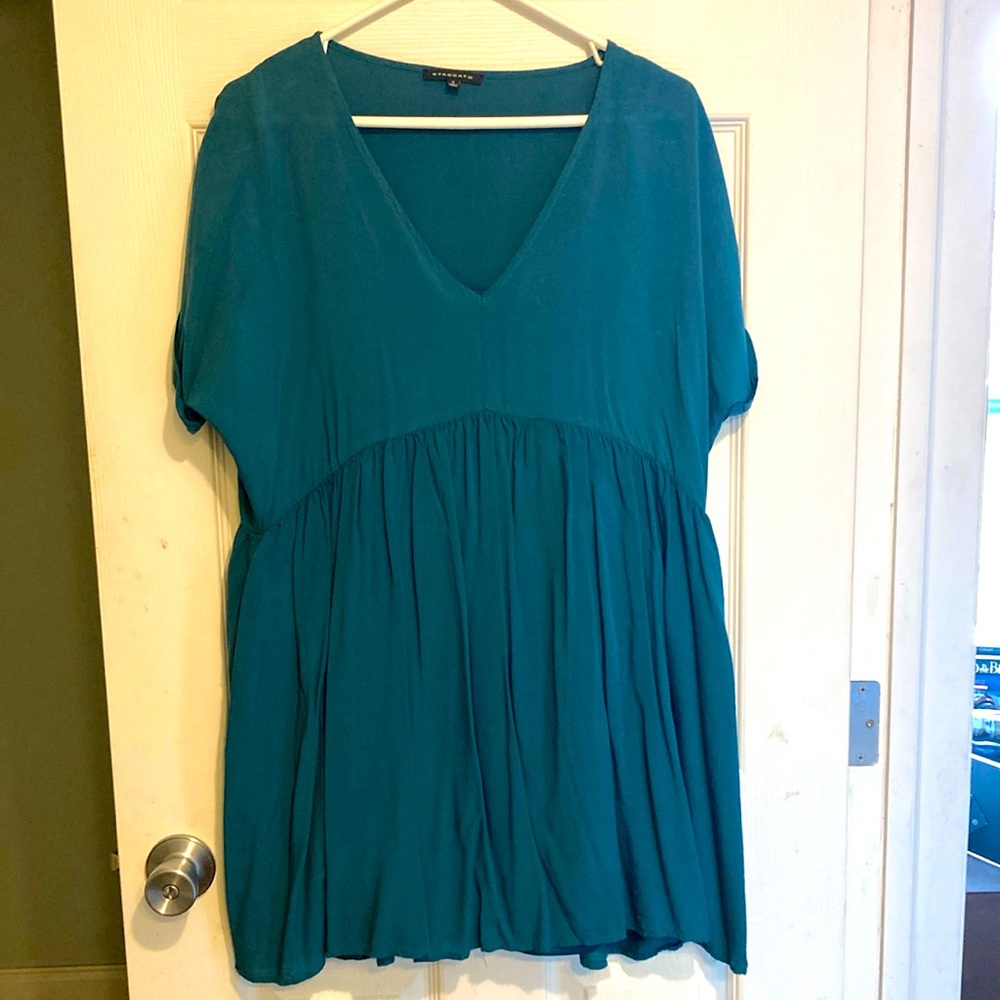 Staccato dress with built in slip and pockets!  Size small